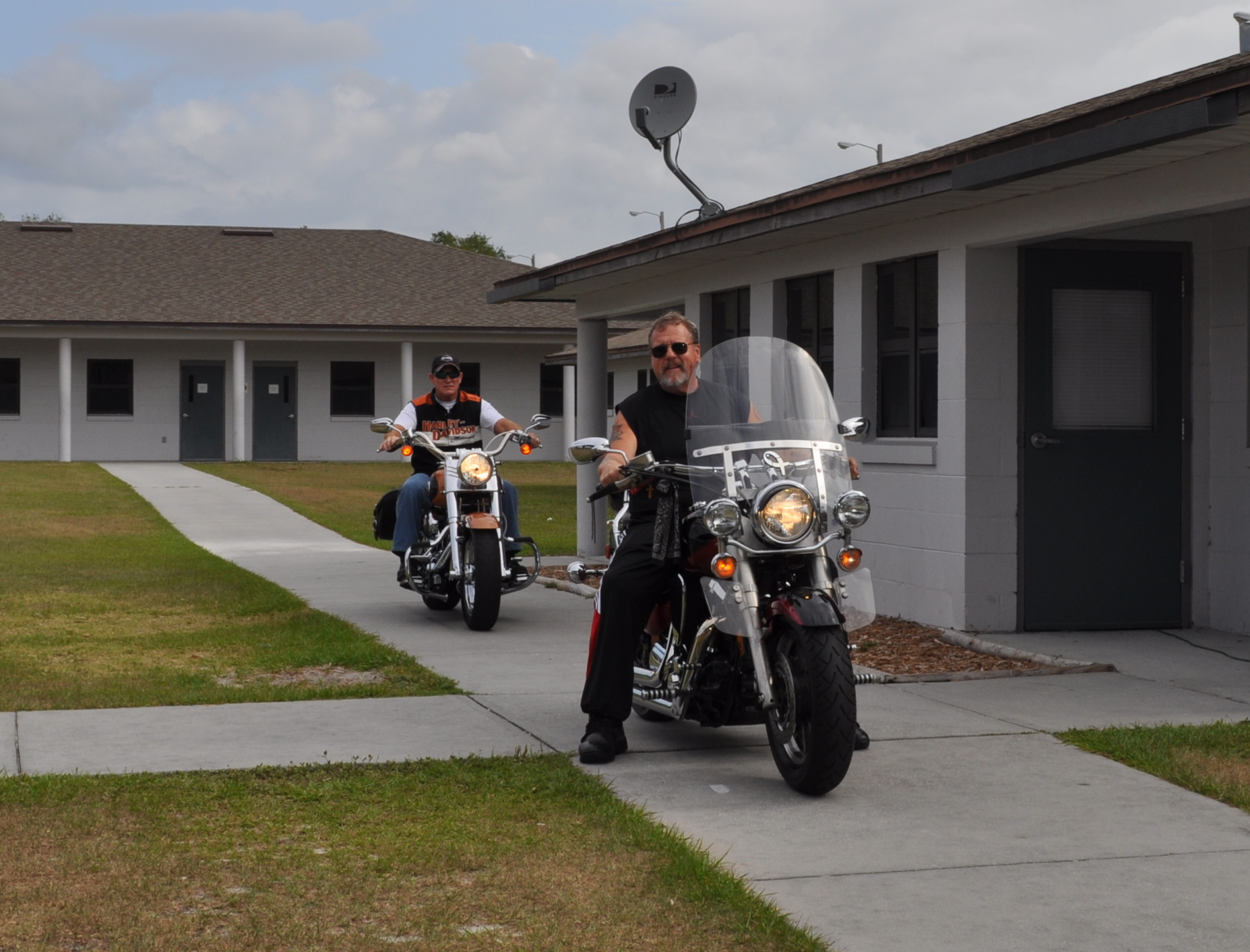 Big Joe and Eddie arriving at Falkenburg Juvenile Detention Center on motorcycles
